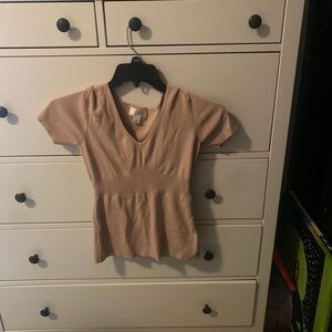 Pink V-neck shirt